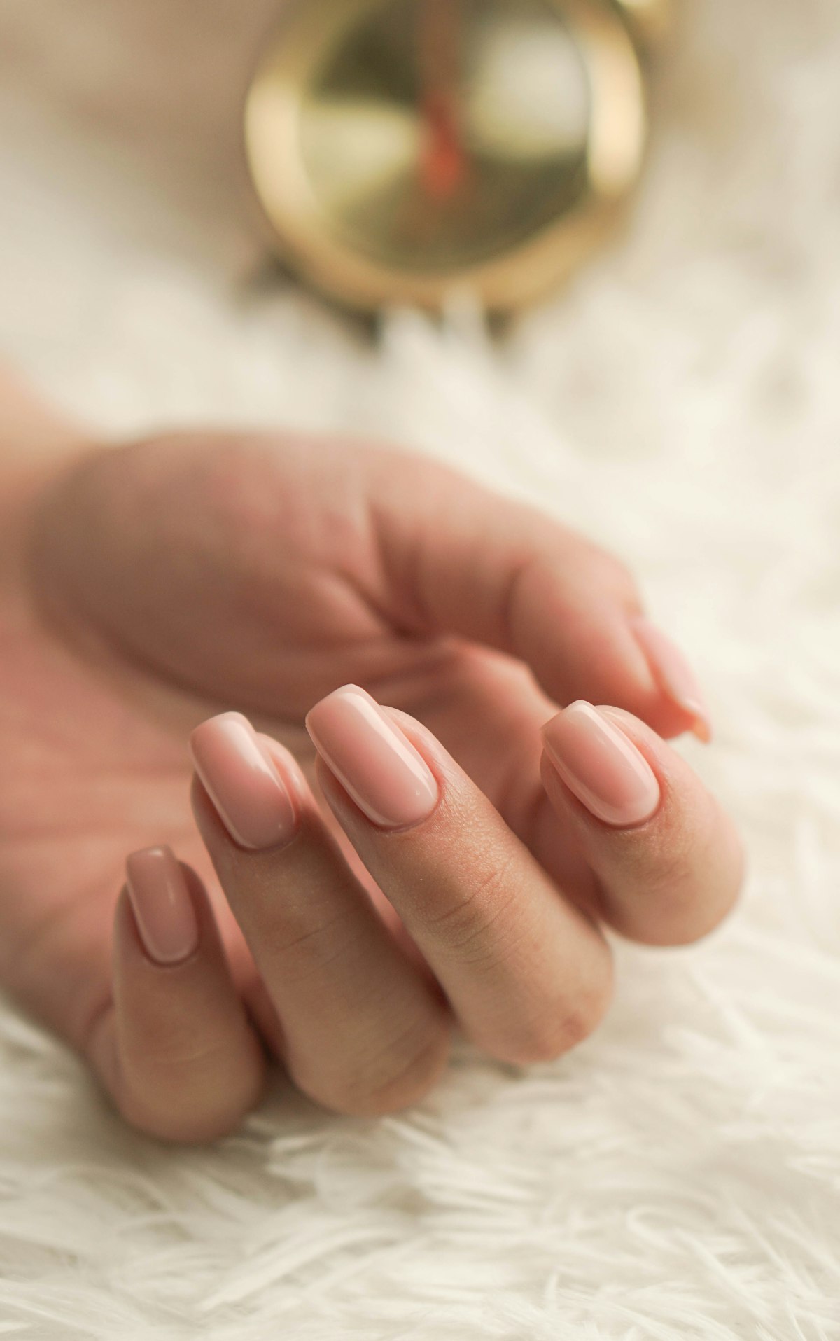 Signature manicure with soft nude polish